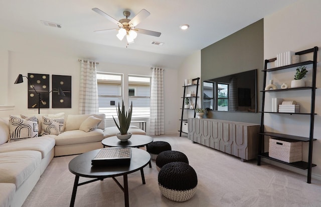 16031 Tangled Vine Ln, Conroe, TX 77378 - carpeted living area with healthy amount of natural light, vaulted ceiling, and a ceiling fan