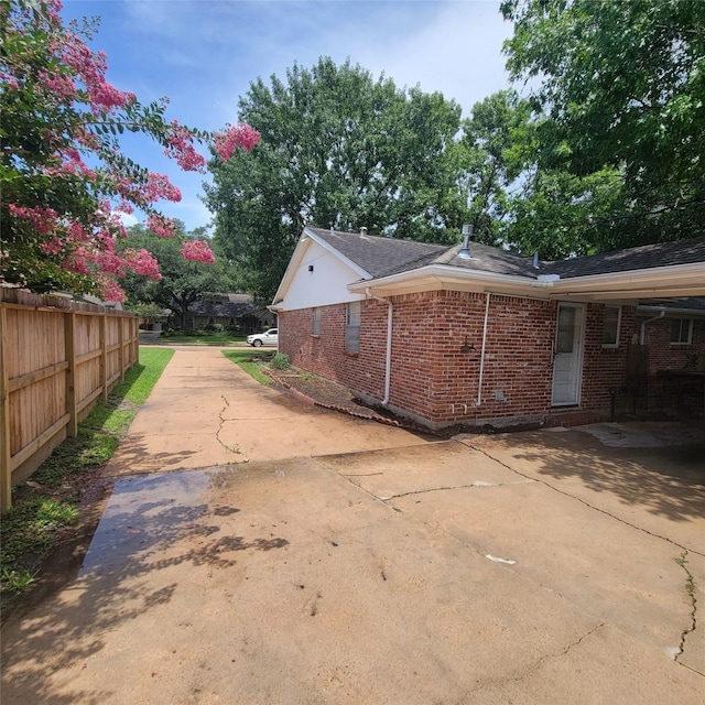5227 Imogene St, Houston, TX 77096 - view of side of home with brick siding