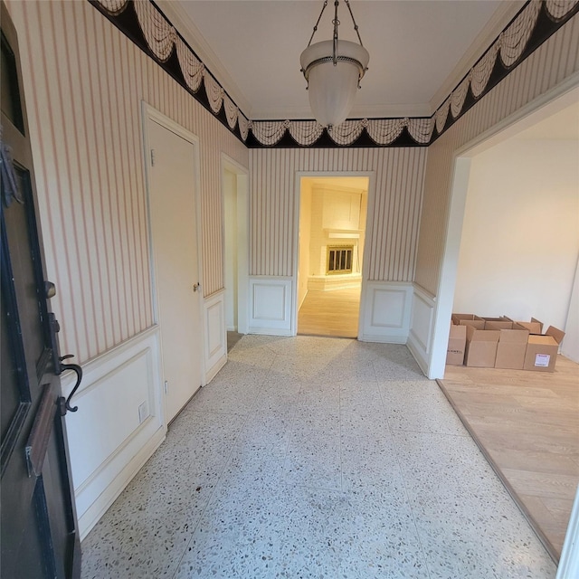 5227 Imogene St, Houston, TX 77096 - spare room with a decorative wall, a wainscoted wall, and ornamental molding