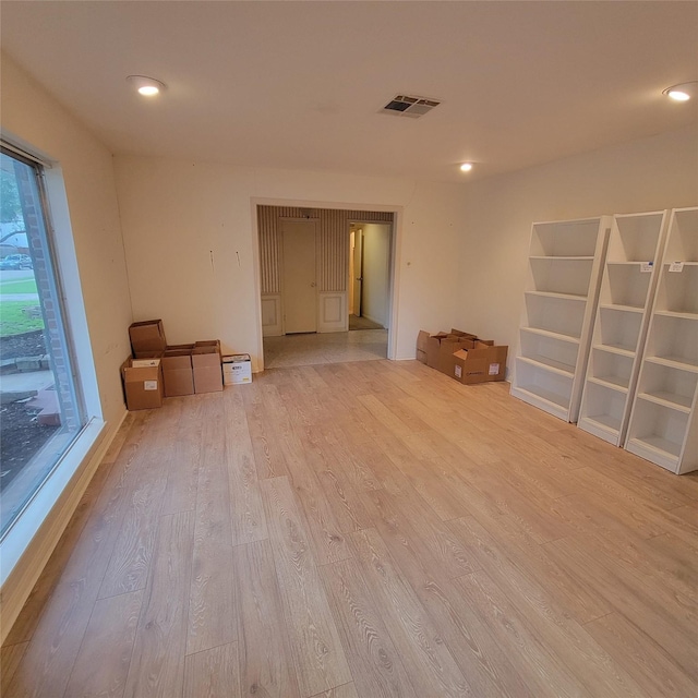 5227 Imogene St, Houston, TX 77096 - empty room with wood finished floors and recessed lighting