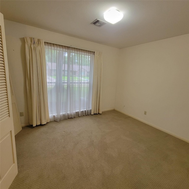5227 Imogene St, Houston, TX 77096 - empty room with light colored carpet