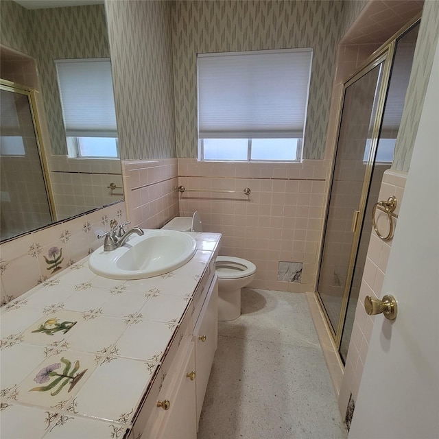 5227 Imogene St, Houston, TX 77096 - full bathroom featuring wallpapered walls, vanity, healthy amount of natural light, wainscoting, and a shower stall