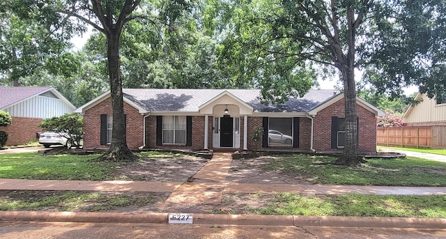 5227 Imogene St, Houston, TX 77096 - single story home with brick siding and roof with shingles