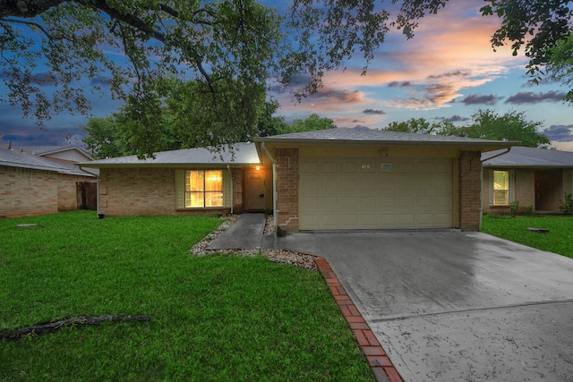 10731 Forest Leaf Dr, Sugar Land, TX 77498 - single story home with a garage, concrete driveway, and brick siding
