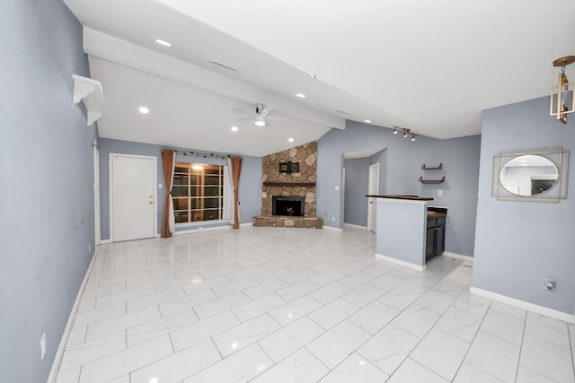 10731 Forest Leaf Dr, Sugar Land, TX 77498 - unfurnished living room with ceiling fan and a fireplace