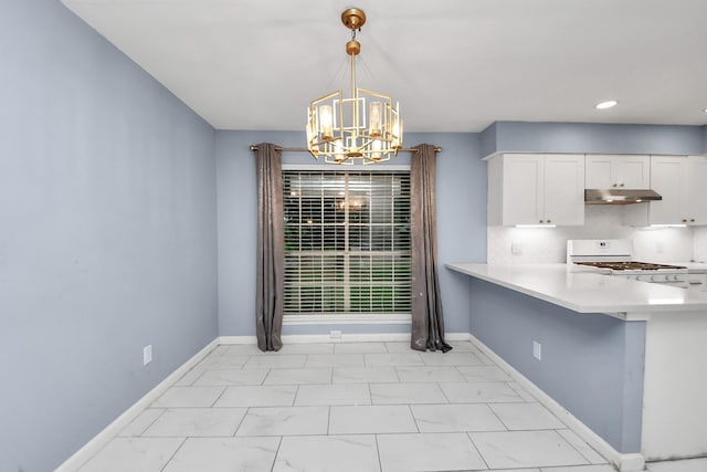10731 Forest Leaf Dr, Sugar Land, TX 77498 - unfurnished dining area with a chandelier and recessed lighting