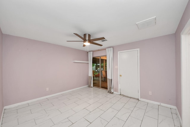 10731 Forest Leaf Dr, Sugar Land, TX 77498 - empty room featuring a ceiling fan and baseboards