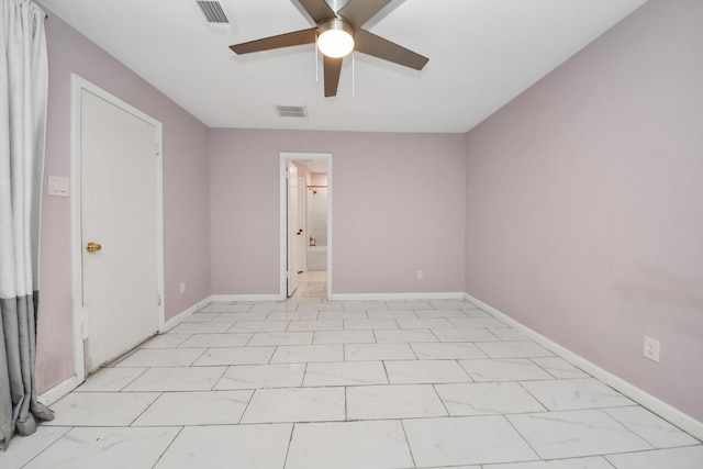 10731 Forest Leaf Dr, Sugar Land, TX 77498 - spare room featuring a ceiling fan and baseboards
