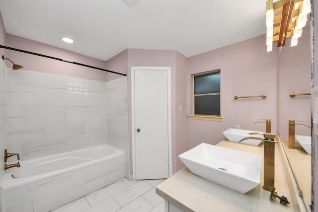 10731 Forest Leaf Dr, Sugar Land, TX 77498 - full bathroom with  shower combination, double vanity, and marble look tiles