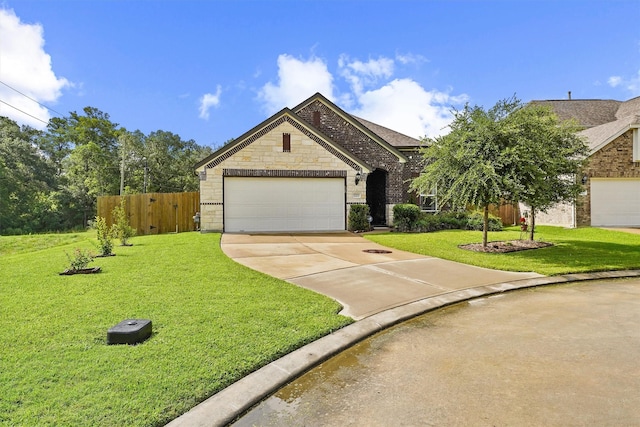 1203 Casal Springs Ct, Crosby, TX 77532 - view of front of property featuring concrete driveway, an attached garage, brick siding, and stone siding