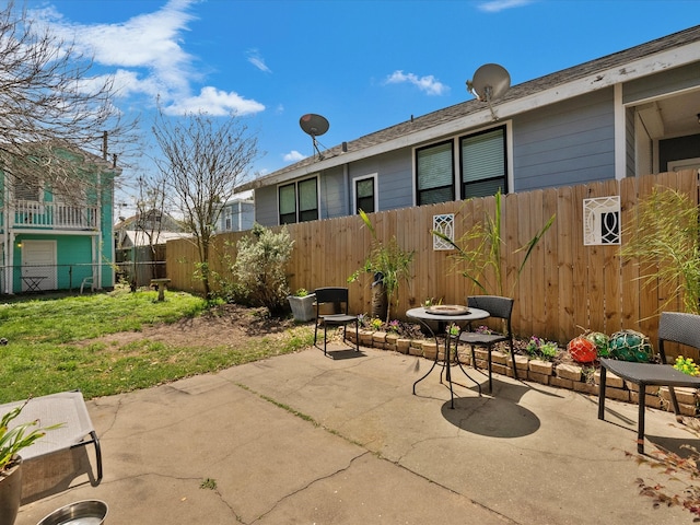 1901 49th St, Galveston, TX 77551 - fenced backyard with a patio