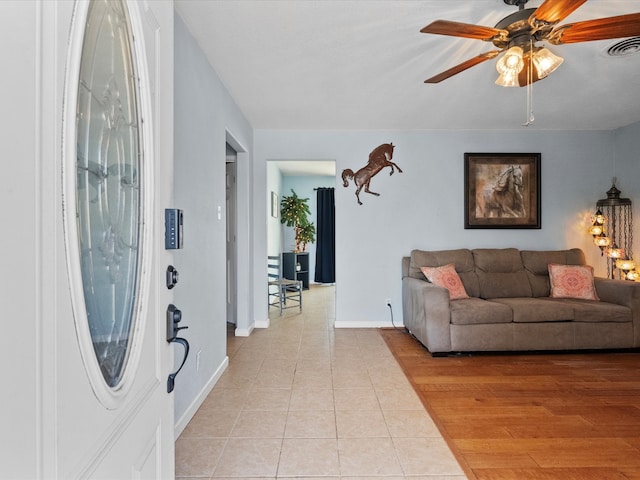 1901 49th St, Galveston, TX 77551 - living area featuring light tile patterned flooring and ceiling fan