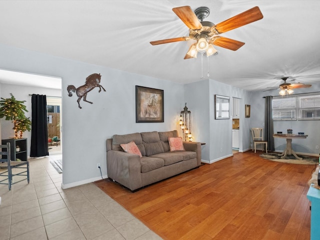 1901 49th St, Galveston, TX 77551 - living area featuring ceiling fan and light tile patterned floors
