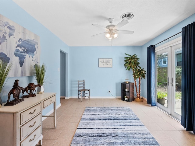 1901 49th St, Galveston, TX 77551 - sitting room featuring light tile patterned floors and a ceiling fan