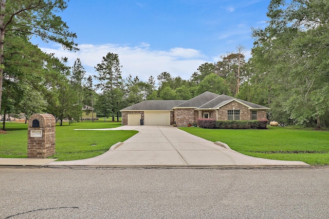 27535 Golf View Ln, Huffman, TX 77336 - view of front of home with a garage, a front yard, driveway, brick siding, and view of scattered trees
