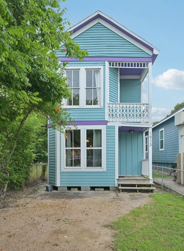1913 Ursuline St, Galveston, TX 77550 - rear view of property with a balcony