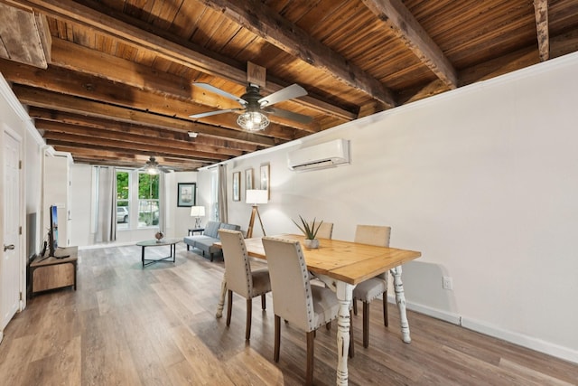 1913 Ursuline St, Galveston, TX 77550 - dining space with an AC wall unit, a ceiling fan, wood finished floors, and a wooden ceiling with exposed beams