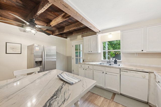 1913 Ursuline St, Galveston, TX 77550 - kitchen featuring dishwasher, stainless steel refrigerator with ice dispenser, a ceiling fan, light wood finished floors, and white cabinets
