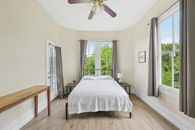 1913 Ursuline St, Galveston, TX 77550 - bedroom with light wood-type flooring and a ceiling fan