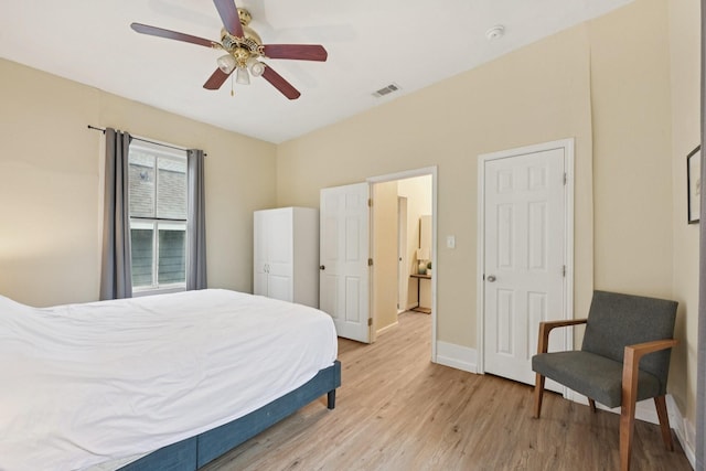 1913 Ursuline St, Galveston, TX 77550 - bedroom with light wood-style flooring and ceiling fan