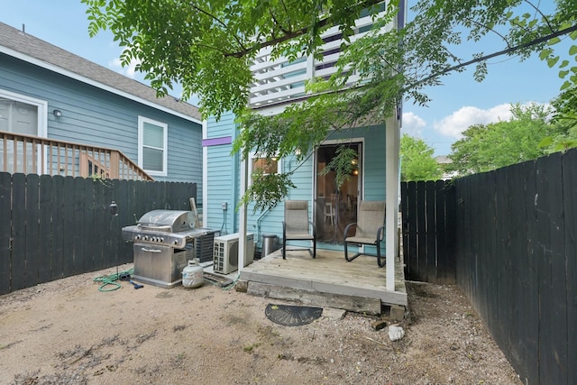 1913 Ursuline St, Galveston, TX 77550 - fenced backyard featuring a grill and an outbuilding