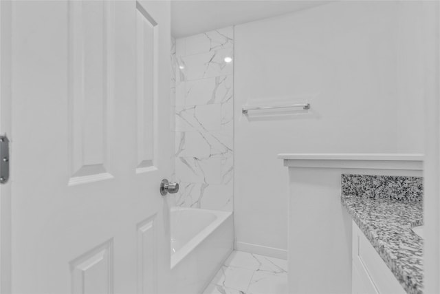 7613 Shotwell St, Houston, TX 77016 - full bathroom featuring marble look tile flooring, vanity, and shower / bath combination