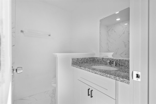 7613 Shotwell St, Houston, TX 77016 - full bathroom featuring marble finish flooring, vanity, and a marble finish shower