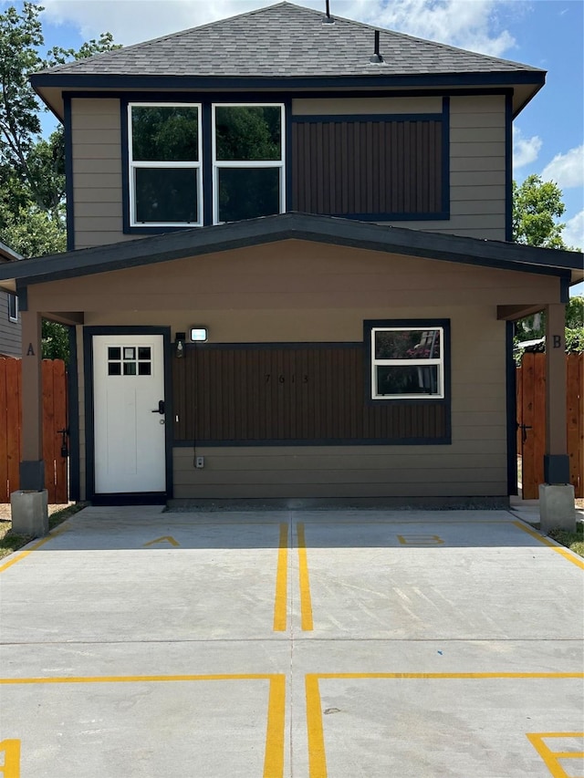 7613 Shotwell St, Houston, TX 77016 - view of front facade featuring roof with shingles