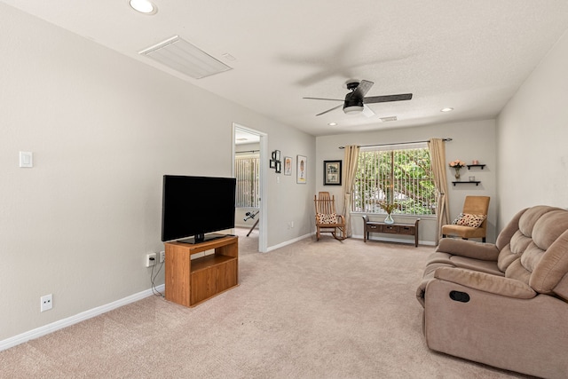 25807 Oakridge Forest Ln, Spring, TX 77386 - living area featuring a ceiling fan, light carpet, and recessed lighting