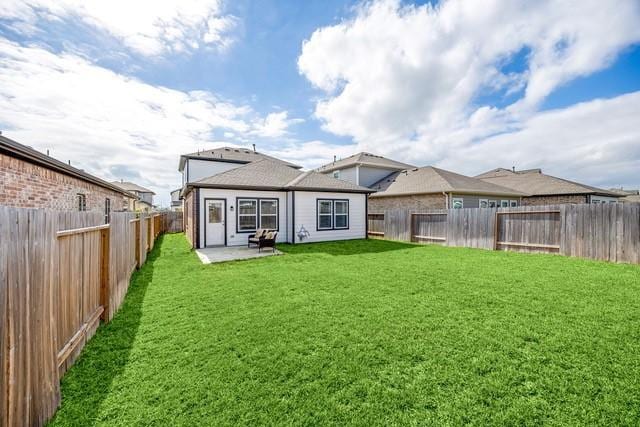 23242 Spring Genesis Ln, Katy, TX 77493 - rear view of property with a patio area and a fenced backyard