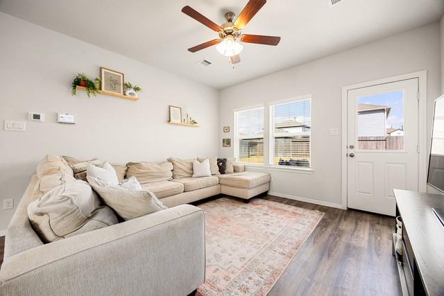 23242 Spring Genesis Ln, Katy, TX 77493 - living room with dark wood-style floors and ceiling fan