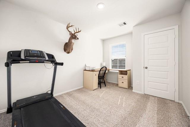 23242 Spring Genesis Ln, Katy, TX 77493 - exercise area with light colored carpet and baseboards