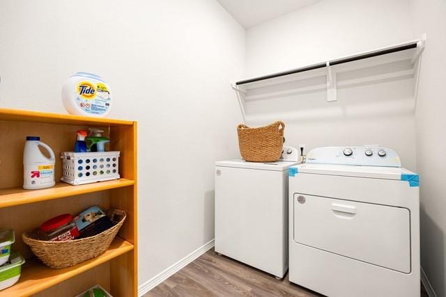 23242 Spring Genesis Ln, Katy, TX 77493 - laundry room featuring washer and dryer and light wood finished floors