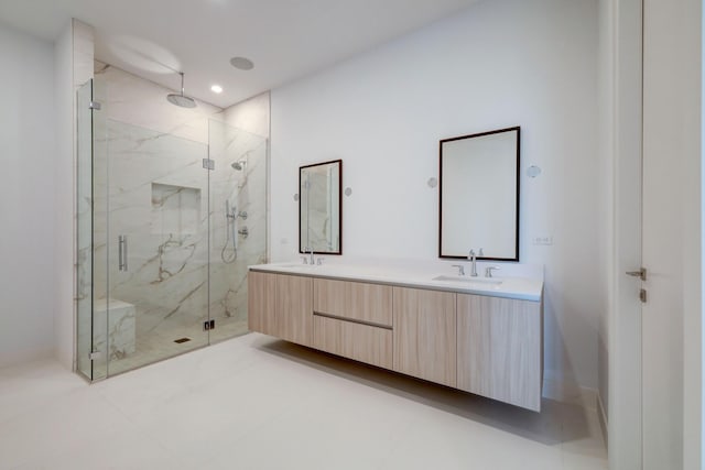 1711 Allen Pkwy Unit 2106, Houston, TX 77019 - bathroom featuring a marble finish shower, double vanity, and recessed lighting