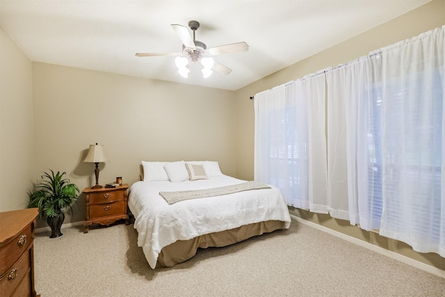 13330 Via Torre De Pisa Ln, Cypress, TX 77429 - carpeted bedroom featuring baseboards and a ceiling fan