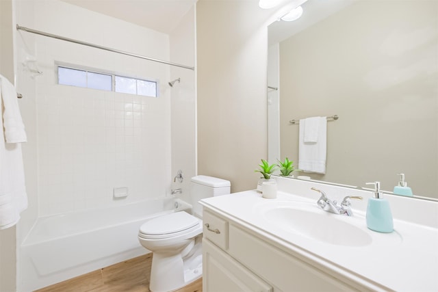 13330 Via Torre De Pisa Ln, Cypress, TX 77429 - full bathroom with vanity, washtub / shower combination, and wood finished floors