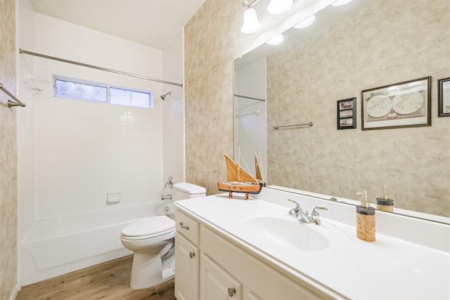 13330 Via Torre De Pisa Ln, Cypress, TX 77429 - bathroom with wood finished floors, vanity, and bathtub / shower combination