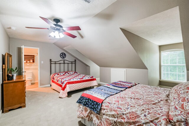 13330 Via Torre De Pisa Ln, Cypress, TX 77429 - bedroom featuring carpet flooring, vaulted ceiling, a ceiling fan, and ensuite bath