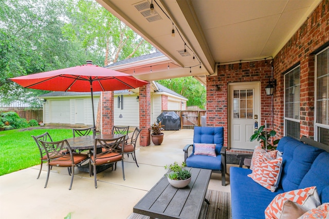 13330 Via Torre De Pisa Ln, Cypress, TX 77429 - view of patio / terrace featuring outdoor lounge area, outdoor dining space, area for grilling, and an outbuilding