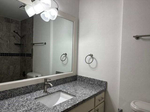 16310 Meadowbrook Farm Rd, Houston, TX 77082 - bathroom featuring vanity and tiled shower