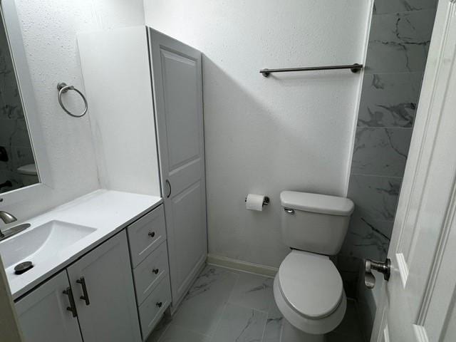 16310 Meadowbrook Farm Rd, Houston, TX 77082 - bathroom with marble look tiles and vanity