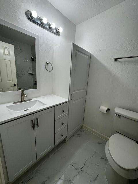 16310 Meadowbrook Farm Rd, Houston, TX 77082 - full bathroom featuring marble finish flooring and vanity