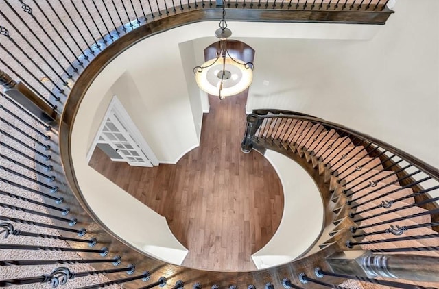 47 Chestnut Meadow Dr, Conroe, TX 77384 - staircase with wood finished floors