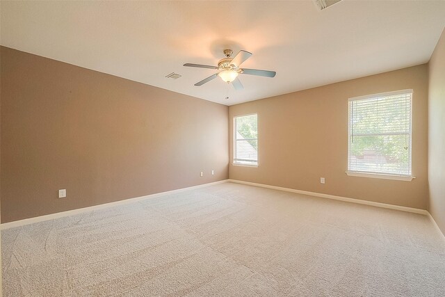 7210 Welshwood Ln, Sugar Land, TX 77479 - spare room with a ceiling fan and light colored carpet