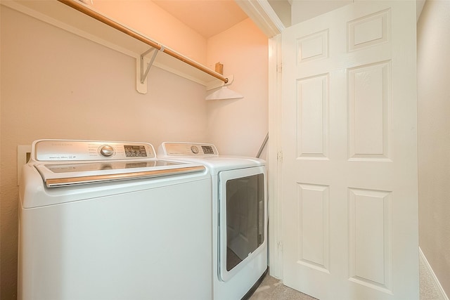 7210 Welshwood Ln, Sugar Land, TX 77479 - laundry room with washing machine and clothes dryer