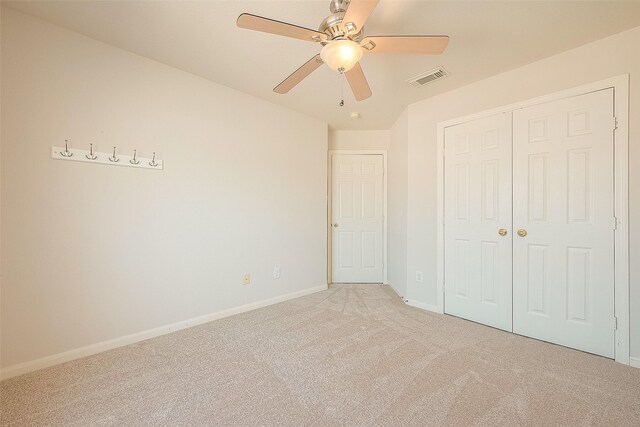 7210 Welshwood Ln, Sugar Land, TX 77479 - unfurnished bedroom with light colored carpet, a closet, and ceiling fan