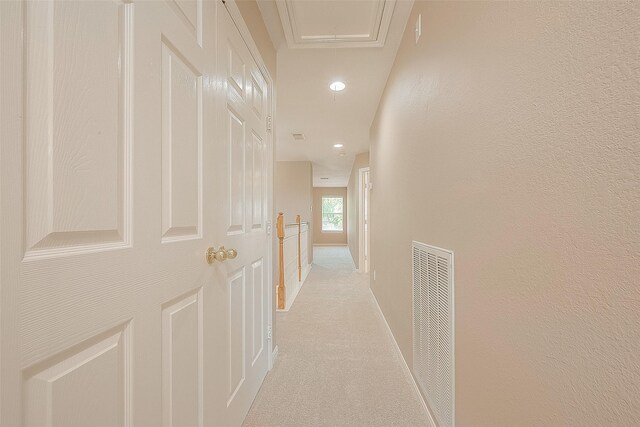 7210 Welshwood Ln, Sugar Land, TX 77479 - hall with light colored carpet, a heating unit, recessed lighting, and attic access