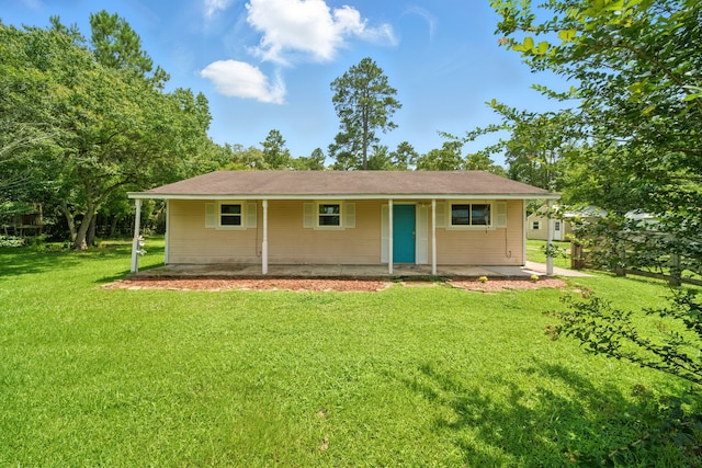 17715 Butera Rd, Magnolia, TX 77355 - ranch-style home with a front yard and a porch