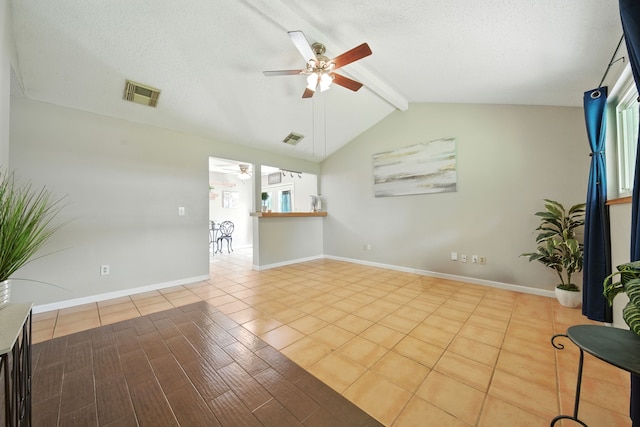 17715 Butera Rd, Magnolia, TX 77355 - unfurnished living room with a ceiling fan, tile patterned floors, and a textured ceiling