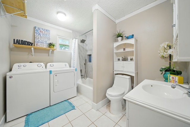 17715 Butera Rd, Magnolia, TX 77355 - full bathroom featuring washer and dryer, crown molding, tile patterned floors, a textured ceiling, and shower / bath combo with shower curtain